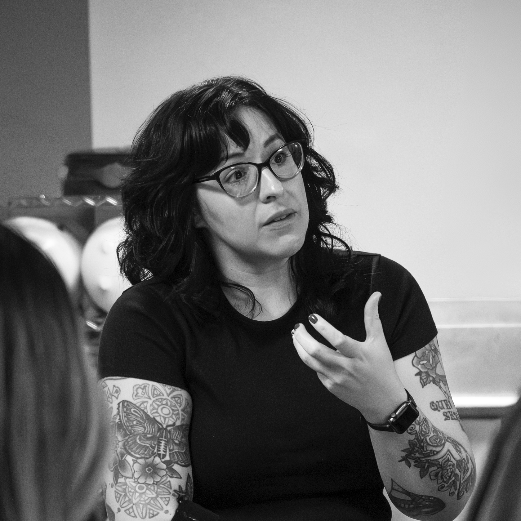 Black-and-white photo of Jessica, wholesale trainer at Klatch Coffee.