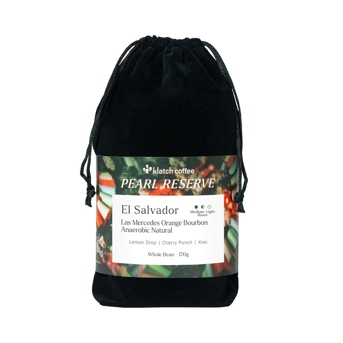 A black velvet drawstring pouch with a printed label for Pearl Reserve El Salvador coffee, shown on a plain white background.