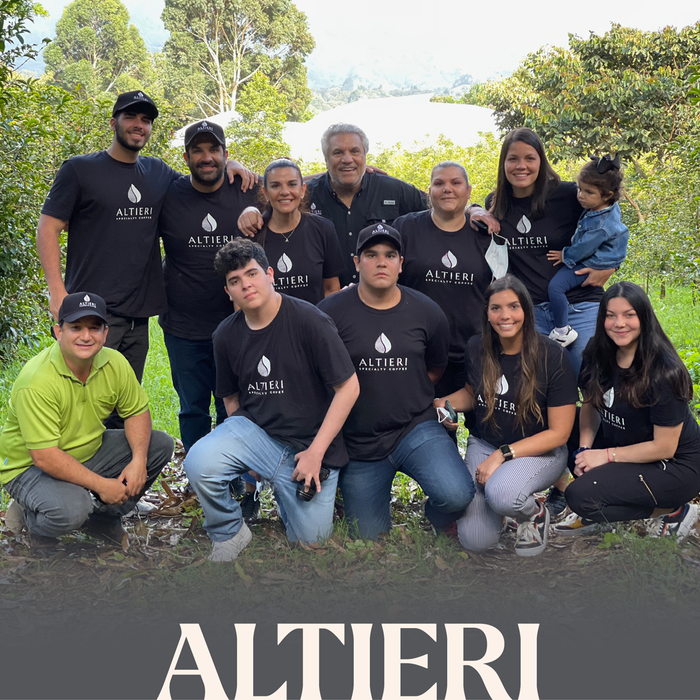 Group photo of 12 family members with the word “ALTIERI” branded in the foreground.