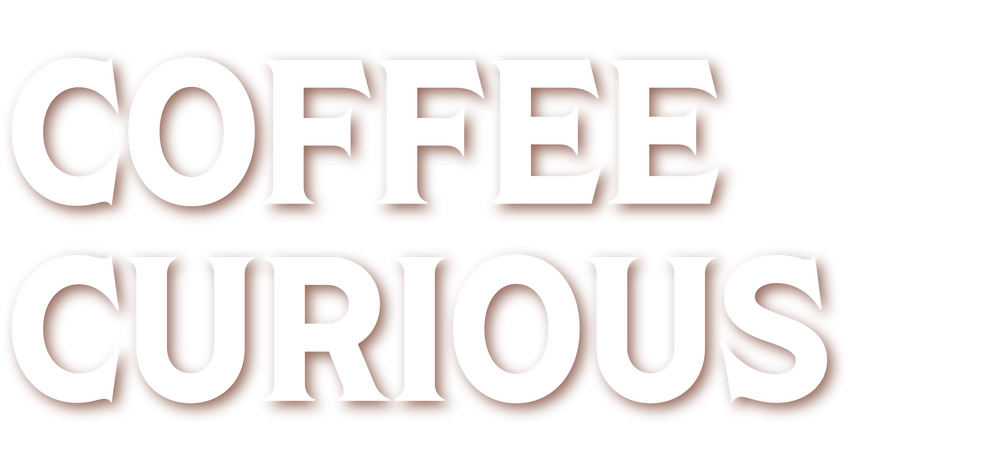 White text that reads coffee curious. 