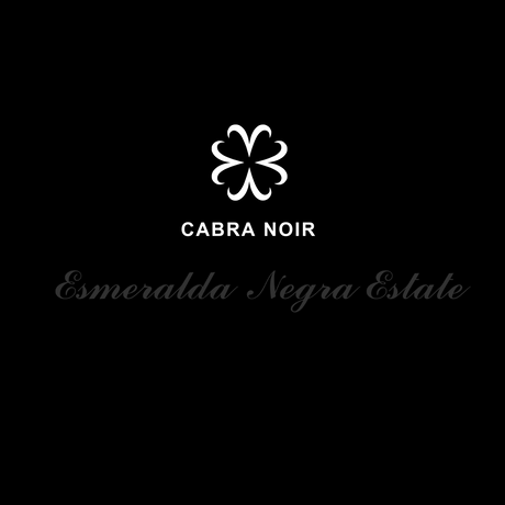 A black square graphic with a white stylized four-petal logo above the text 'CABRA NOIR' in white and 'Esmeralda Negra Estate' in gray script.