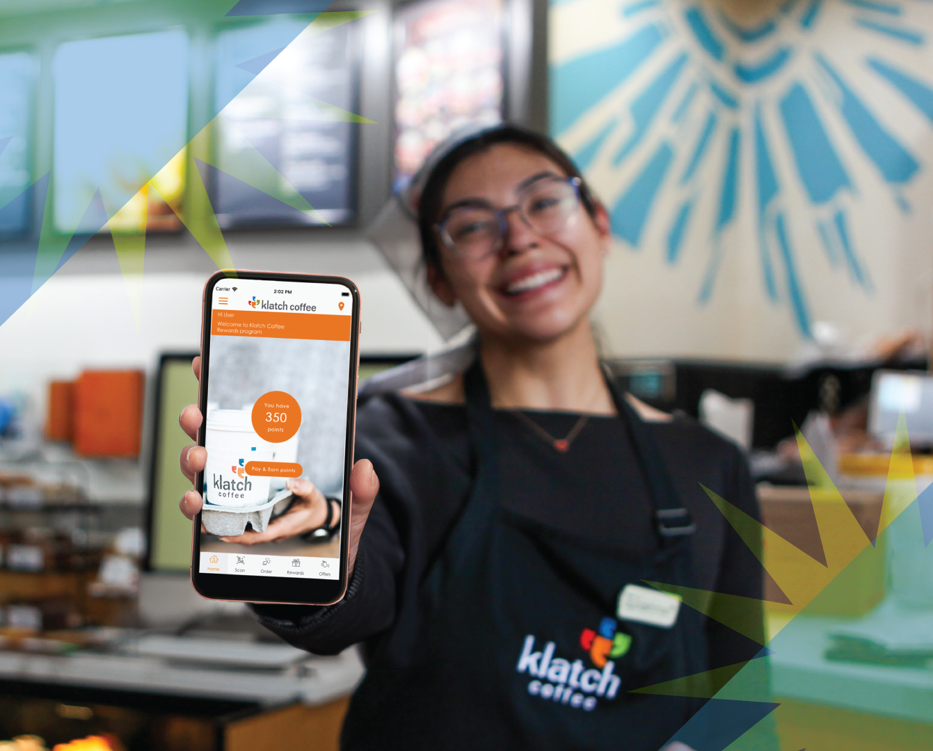 Barista in a café setting holding a phone with the Klatch app toward the camera, with blue and yellow shapes in the foreground.