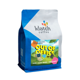 Klatch coffee bag with 'Out of Office' flavor description on a white background