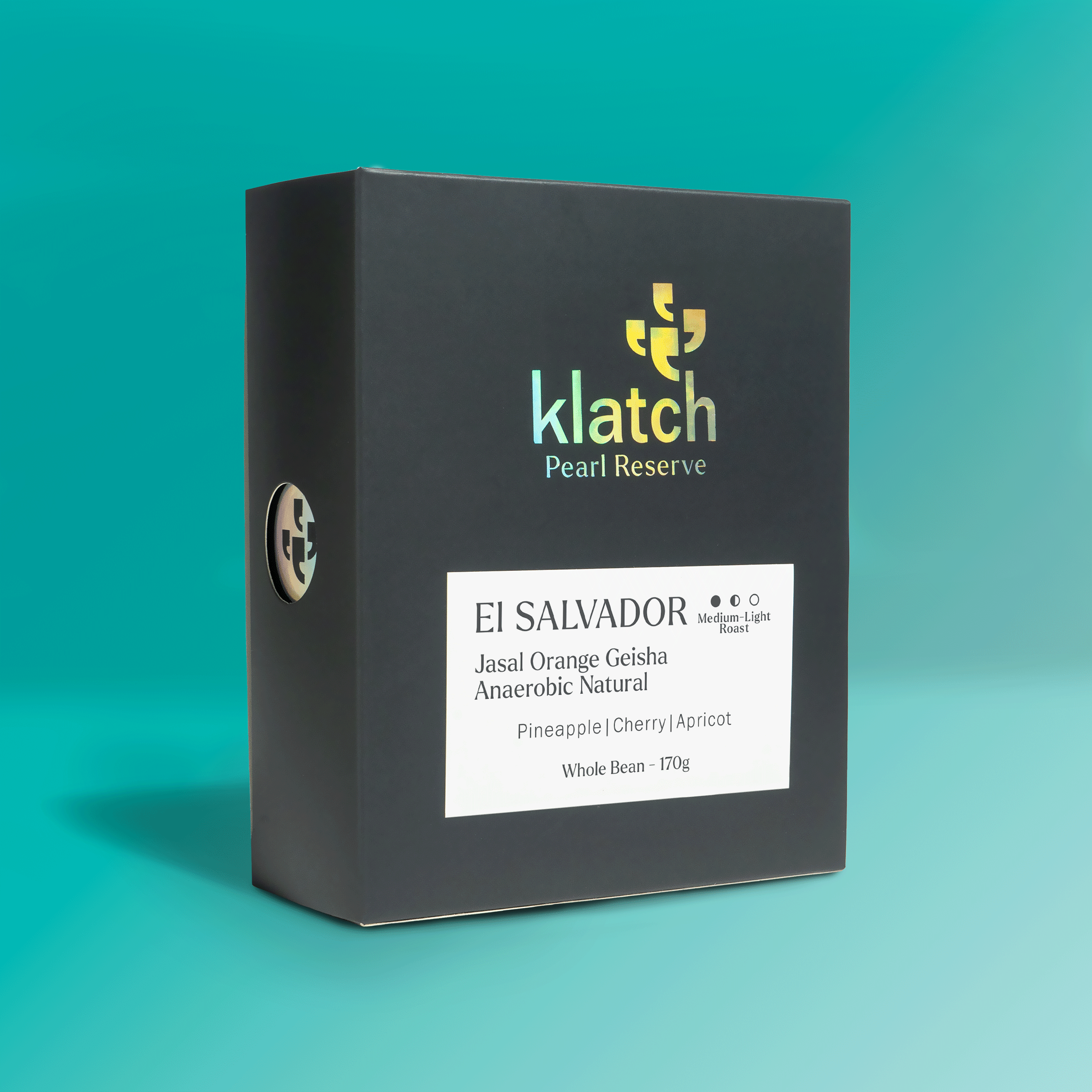 Klatch Coffee El Salvador Jasal Orange Geisha coffee bag on a turquoise background.