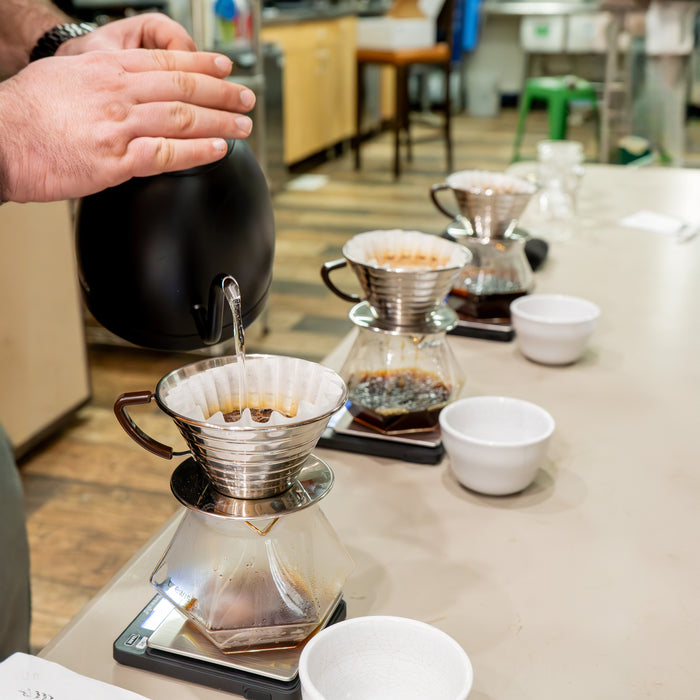Brewing pour over coffee.