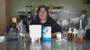Video of a woman demonstrating how to make cold brew using Klatch Coffee Crazy Goat Blend and a Toddy brewer in a coffee lab.