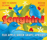 Coffee label with blue birds, flowers, and text on a yellow background